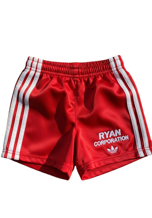 Red Athletic Shorts with White Stripes and Logo