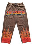 Brown Sweatpants with Flame Graphics, Gradient Text, and Stud Accents – Ryan Corporation